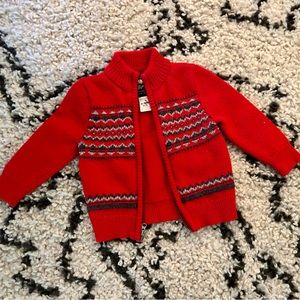 OshKosh red zip up sweater. 9-12 months.